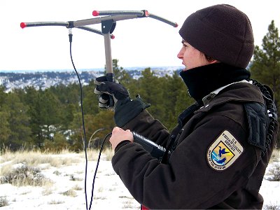 January 2013 - US Fish and Wildlife Service employee Mary Jo Hill attempting to locate two radio collared mountain lions siblings (a male and a female) with radio direction finding equipment. They had photo
