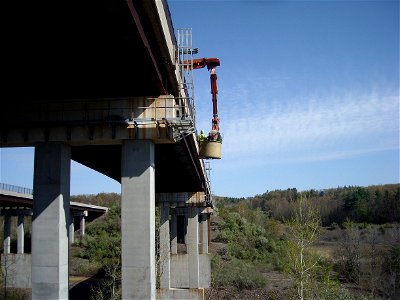 MassDOT crews and MassWildlife officials in late April converged on the I-190 bridge over the Quinapoxet River in Holden where ravens were nesting- and peregrine falcons were soon to join them. Peregr photo