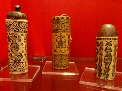 Exhibit in the Oceanic collection of the Staatlichen Museums für Völkerkunde München, Maximilianstraße 42, Munich, Germany. Betel containers, bone and bamboo, Timor, 1925-1952. photo