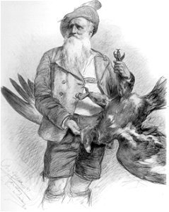 Eagle hunter Leo Dorn holding an eagle.