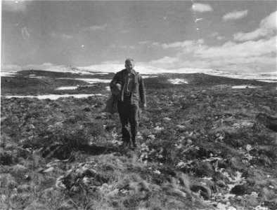 Image title: Man carrying caribou calf in gunny sack across tundra Image from Public domain images website, http://www.public-domain-image.com/full-image/vintage-photography-public-domain-images-pictu photo