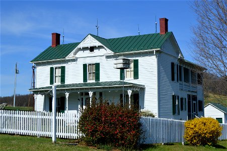 Front and southern side of the Maple Front Farmhouse, located on Cales Springs Road west of Middlebrook in Augusta County, Virginia, United States.  Built in 1900, it is listed on the National Registe