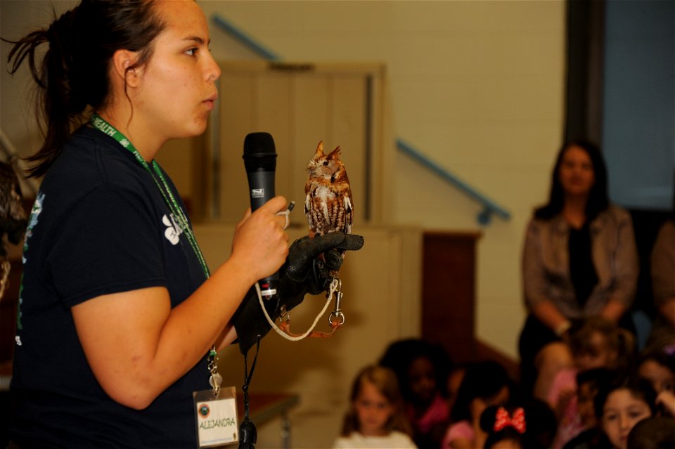 Alejandra Palacio, Alabama 4-H Science School environmental educational instructor, educates Maxwell Elementary and Middle School students about the Eastern Screech Owl during the Birds of Prey demons