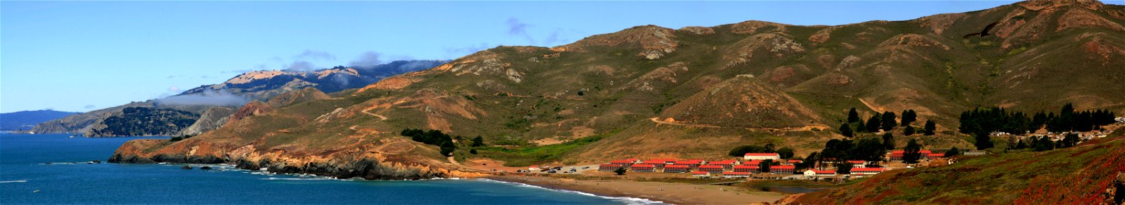 Fort Cronkhite and Rodeo Beach. The bird in the upper right corner is Turkey Vulture (Cathartes aura) photo