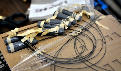 Brand new tail-mount VHF transmitters ready for mounting. Biologists attach one or two transmitters to the tail feathers of each condor.