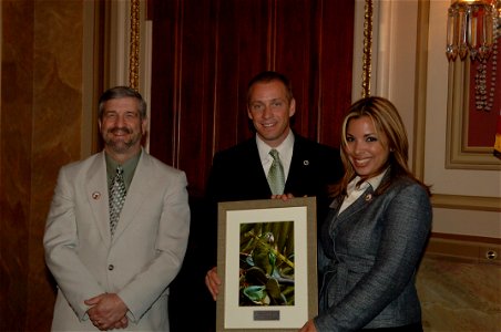 Assignment: 48-DPA-N_FWS_PR_Parrot] Reception, [attended by Fish and Wildlife Service Director H. Dale Hall and other Interior officials, publicizing the] Puerto Rican Parrot Recovery Program, [a coop