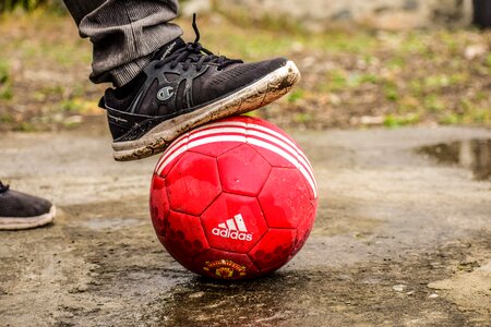 Playing football ball shoe on the ball