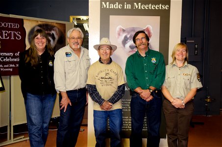 John Hogg (center), responsible for taking the first Meeteetse ferret away from his dog Shep in 1981, poses with (left to right) U.S. Fish and Wildlife Service employees Kimberly Tamkun, Stephen Torbi