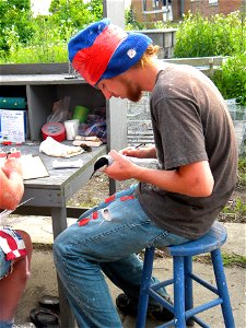 A volunteer checks the band number of a roseate tern.


Credit: Sarah Nystrom