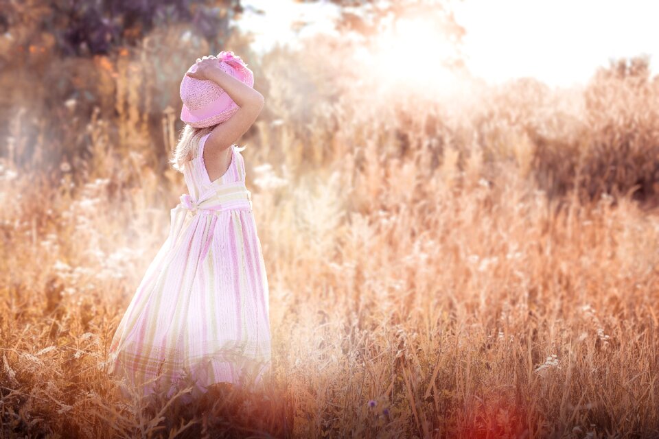 Little girl meadow wildflowers