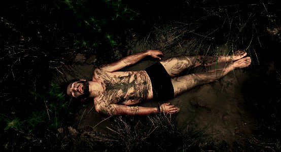 Man Laying Mud