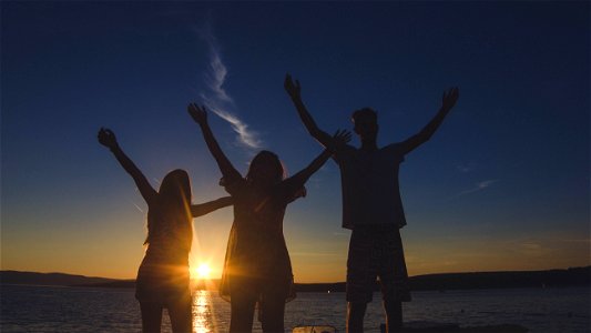 Sunset Three People