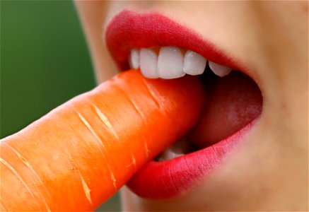 Mouth Eating Carrot photo
