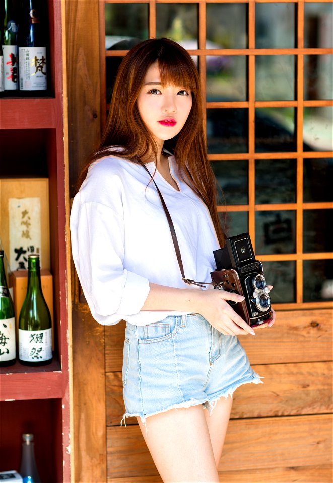 Woman Twin Lens Reflex Camera