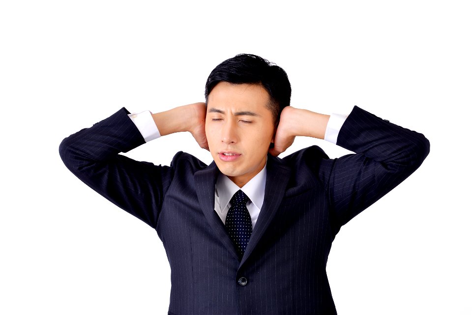 Businessman Stopping Ears