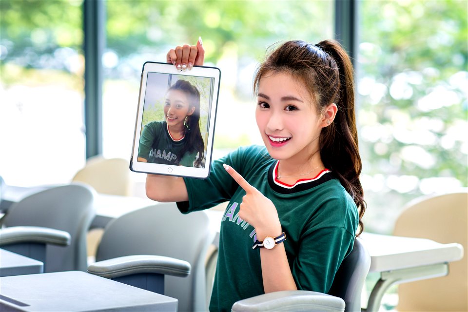 College Girl Pointing Tablet Pc