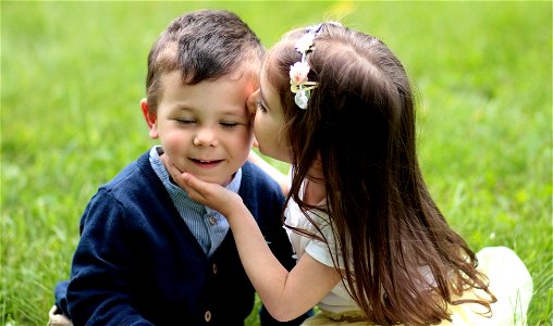 Couple Kids Kiss photo