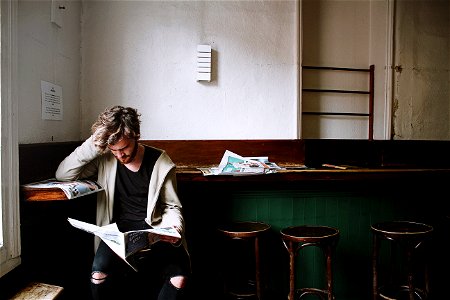 Man Reading Newspaper photo