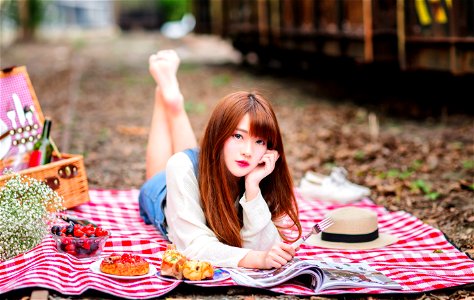 Woman Picnic Magazine photo