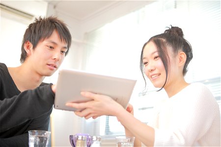 Couple Tablet Computer photo