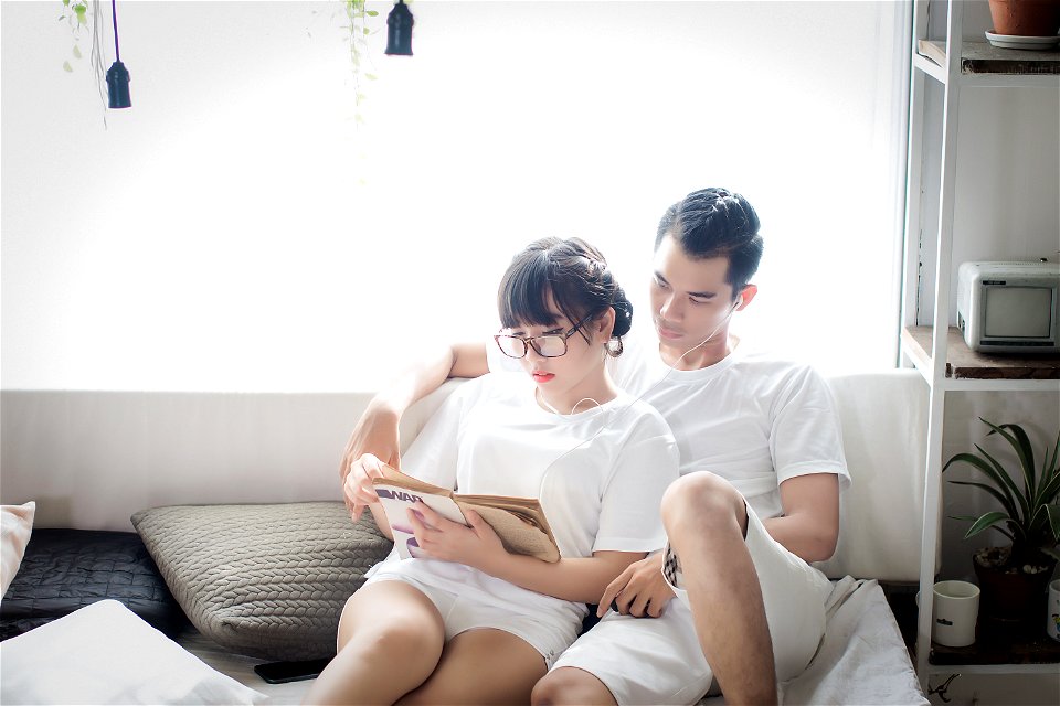 Couple Reading Listening