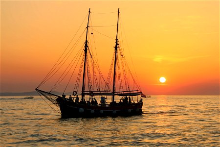 Sunset Sailing Ship photo