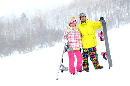 Couple Snowboarding