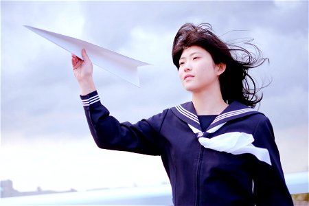 Girl Paper Airplane photo