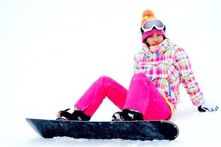 Woman Snowboarding