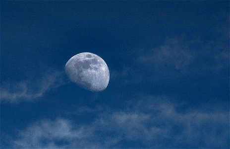 Moon In Cloudy Blue Sky photo