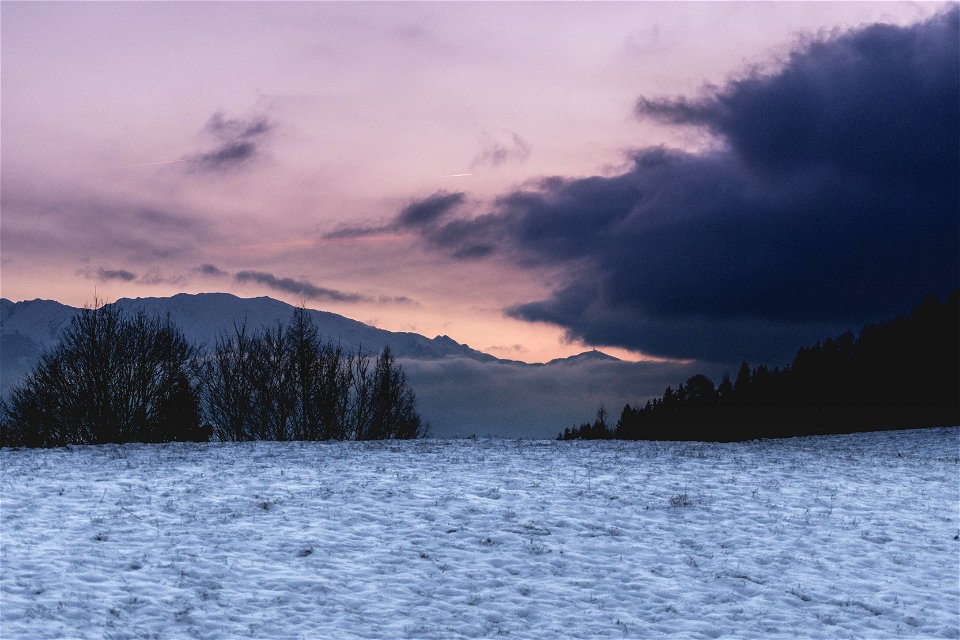 The colors of the sky during sunset with clouds in Austria.