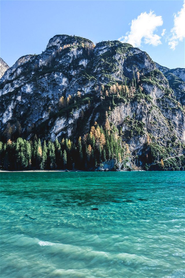 A day next to the blue waters of a mountain lake in Italy