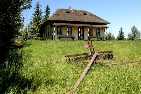 Old homestead and tiller photo