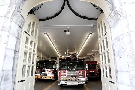 Fire Trucks Leaving Fire Station photo