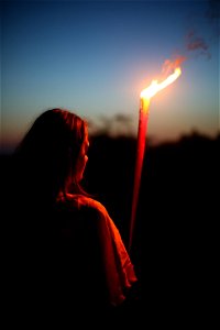 Girl holding a Fire Stick photo