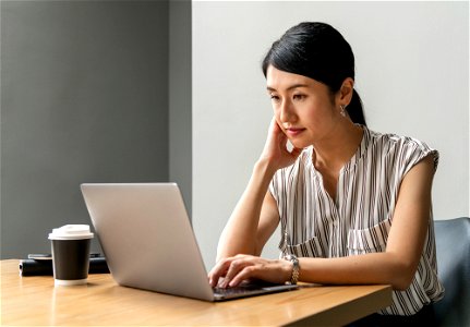 Japanese woman working on a laptop photo