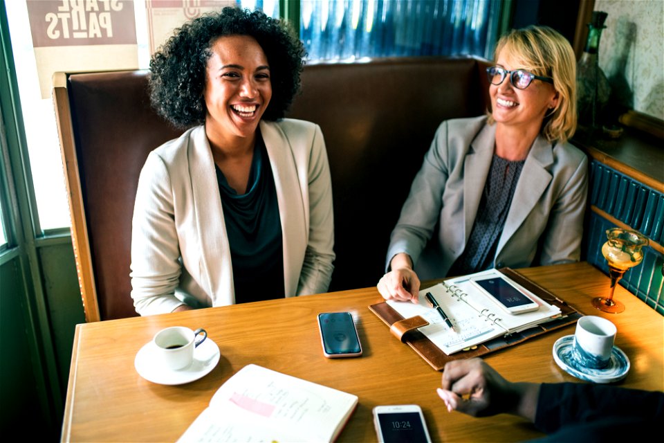 Businesswomen discussing and having fun photo