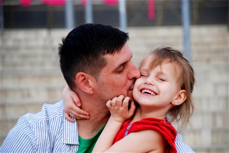 Father Daughter Kiss photo