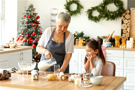 Grandmother Granddaughter Making Sweets photo