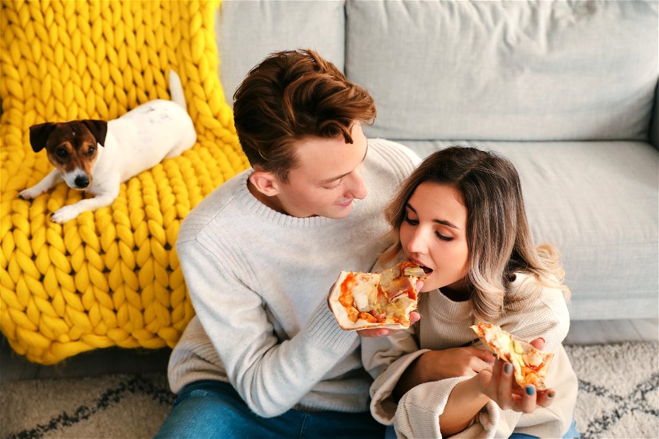 Couple Eat Pizza Dog