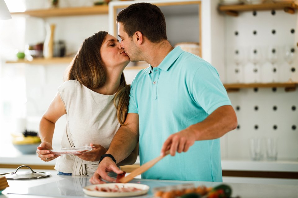 Couple Kiss Breakfast