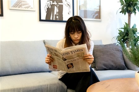 Newpaper Woman Read photo
