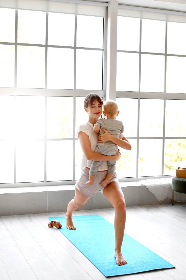 Mother Yoga Baby Stretching photo