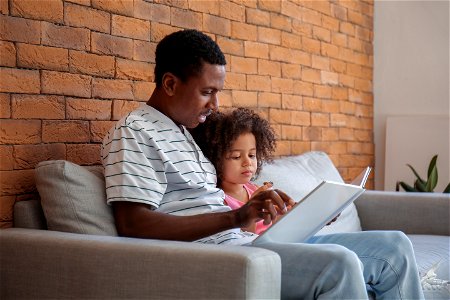 Father Daughter Reading Book