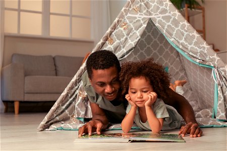 Father Daughter Reading Book
