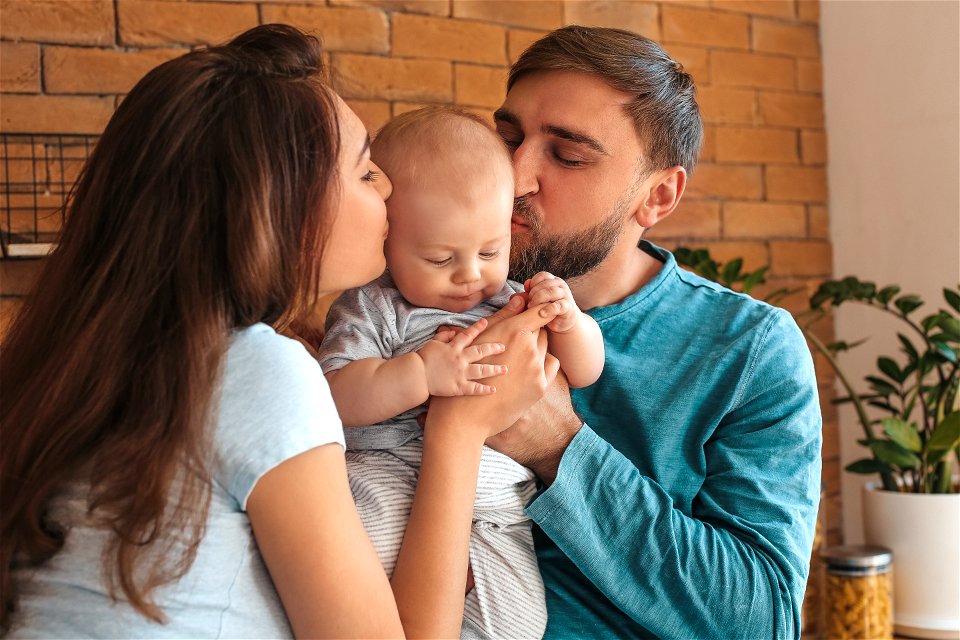 Father Mother Baby Kiss
