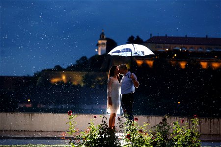 Couple Kiss Rain Umbrella photo