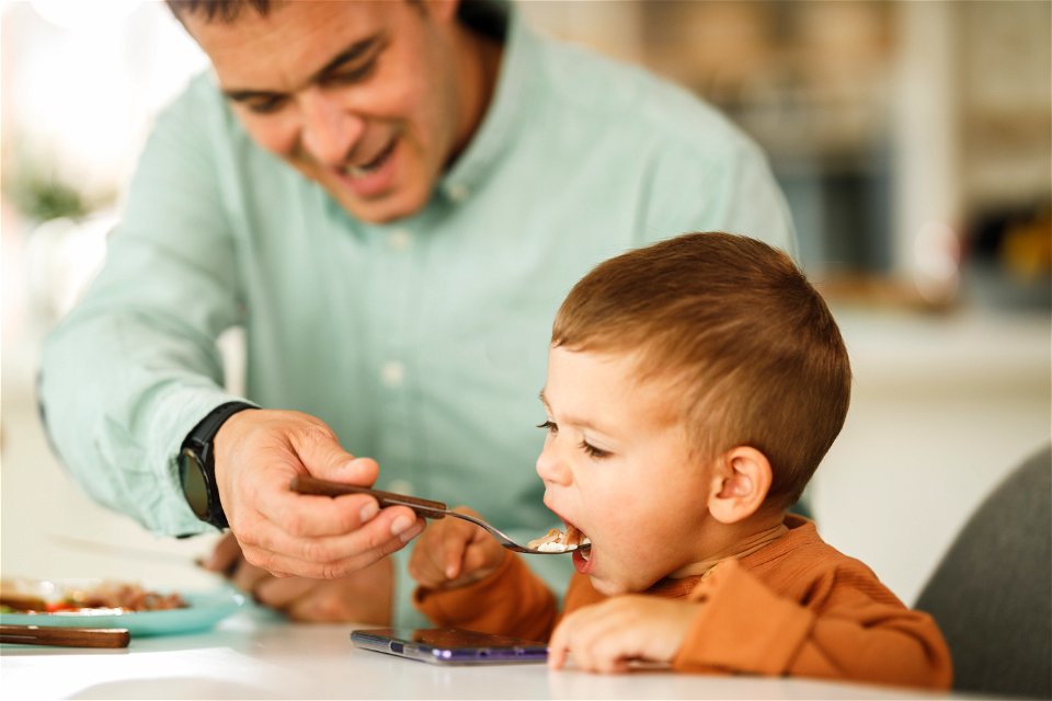 Father Son Eating Breakfast