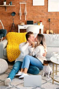 Couple Kiss Dog photo