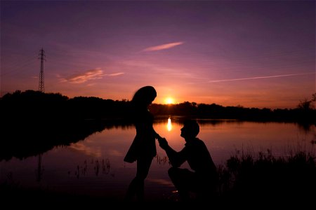 Couple Propose Sunset Lake photo